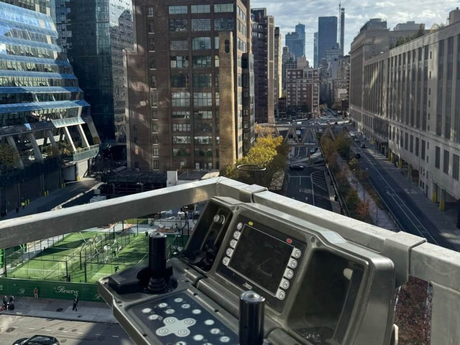 Lift controls in the basket above a newly built New York street