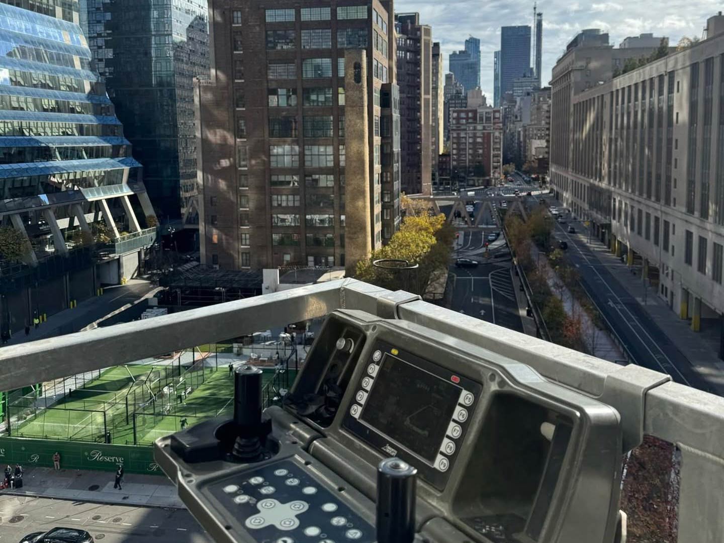 Lift controls in the basket above a newly built New York street